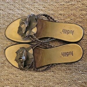 JUDITH bronze sandals with double braided straps, rosette at toe.  Size 7.
